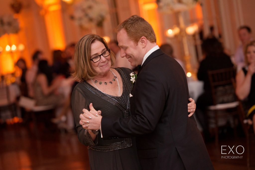 groom and his mother dancing at Bourne Mansion