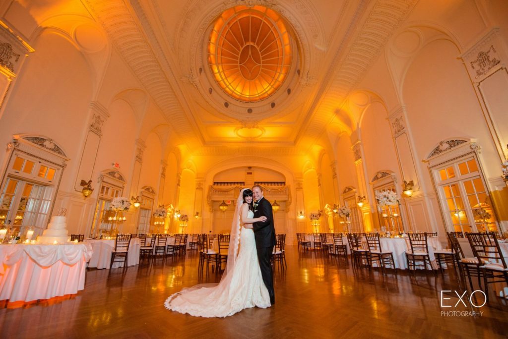 bride and groom in the ballroom at Bourne Mansion