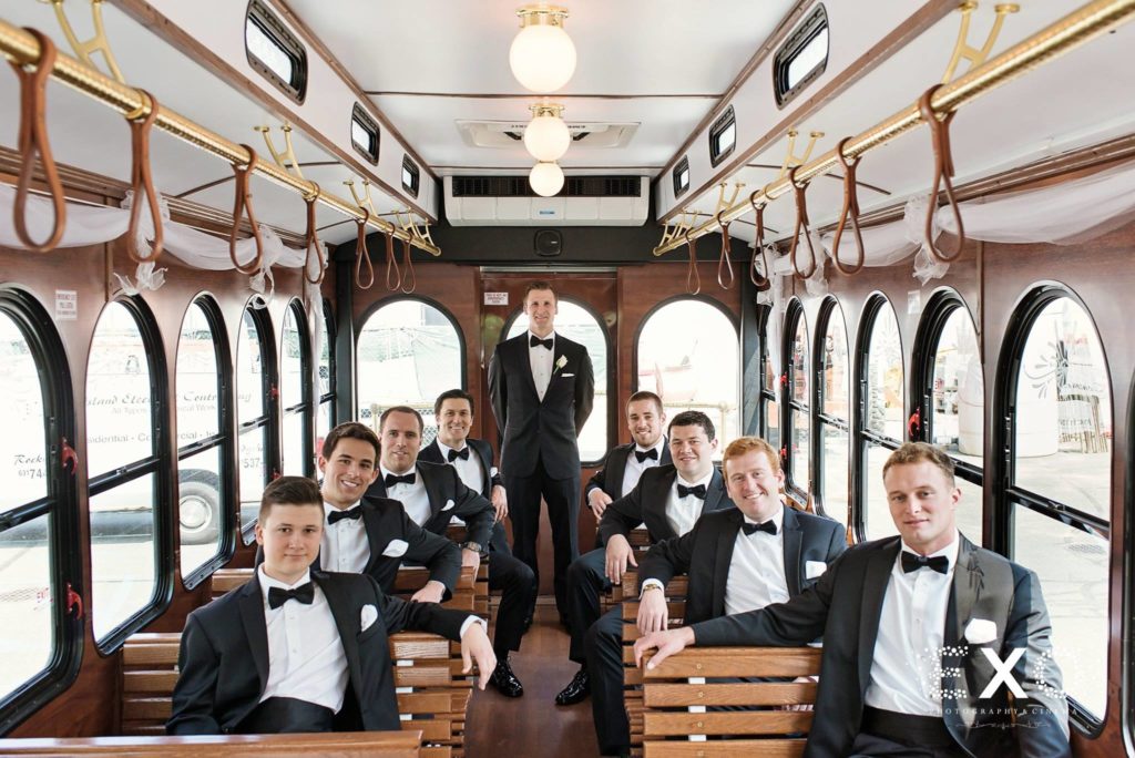 groom and groomsmen on the ferry