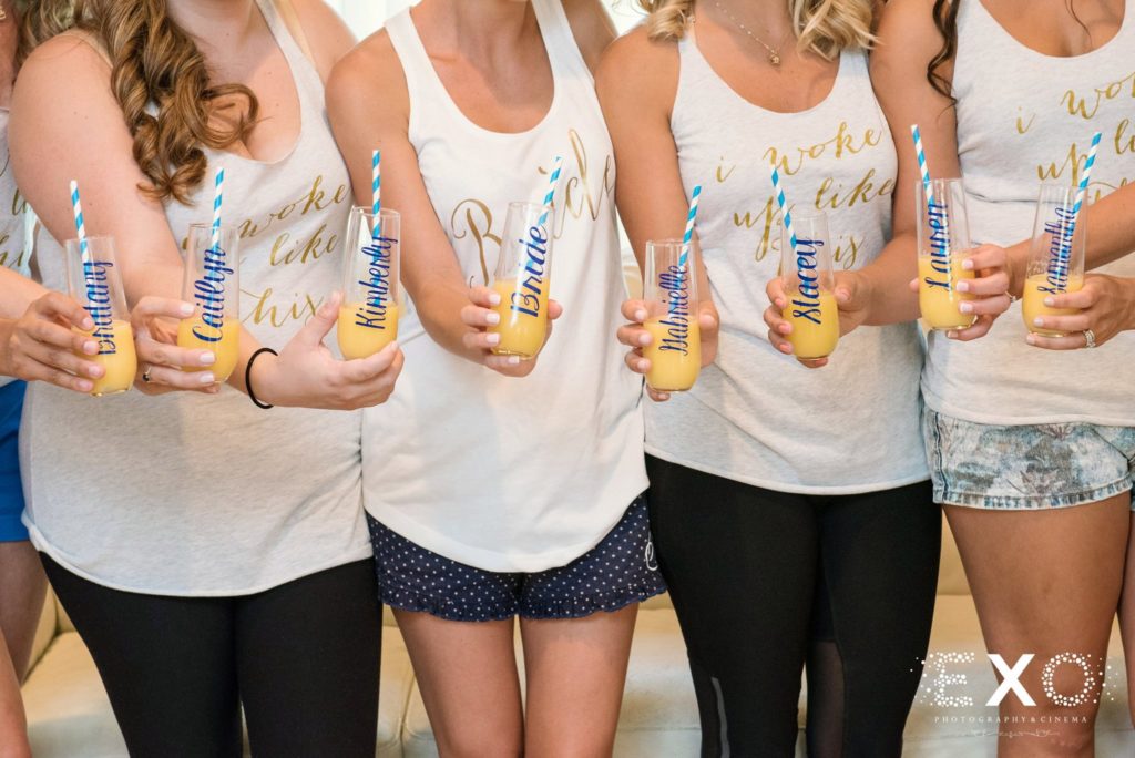 bride and bridesmaids in customized pajamas with customized cups