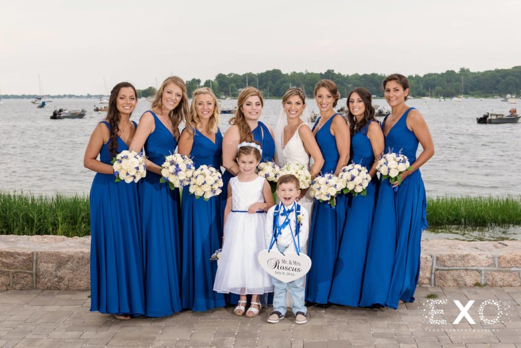 bride and bridesmaids with flower girl and ring bearer outside Carlyle on the Green