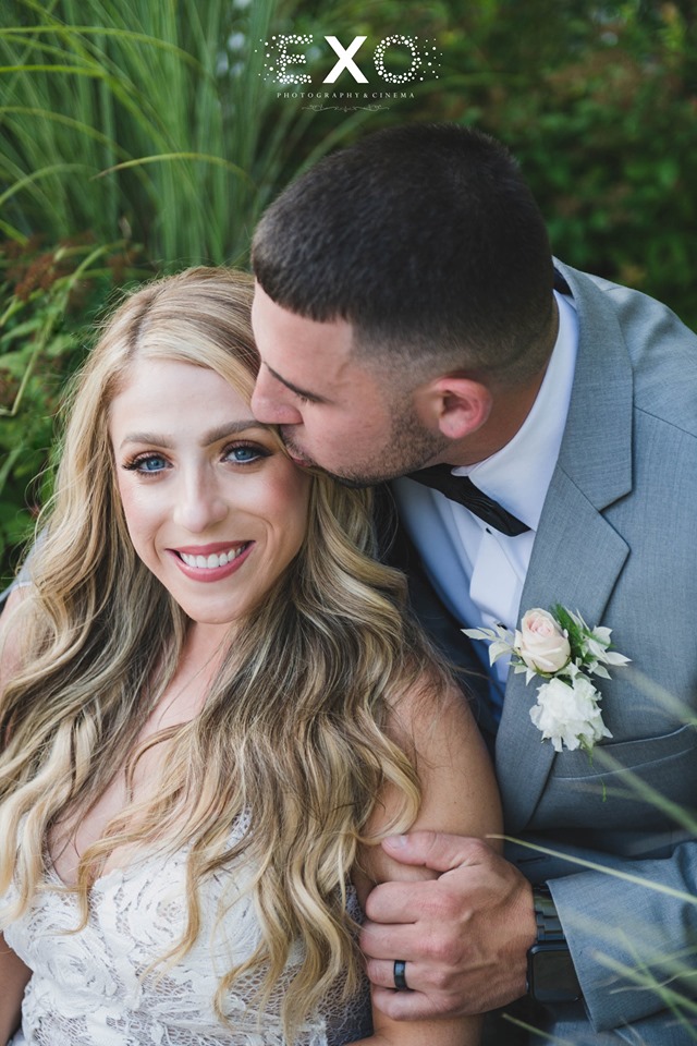 stunning bride and groom smiling
