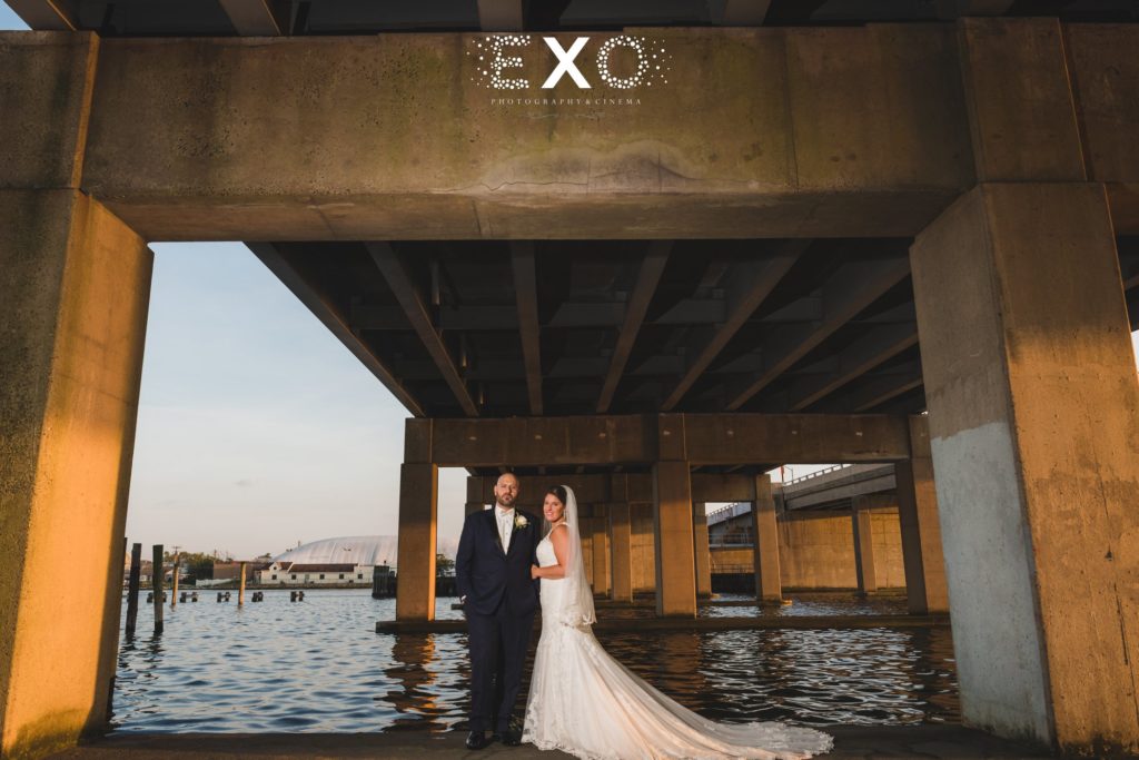 bride and groom under the bridge at The Loft by Bridgeview