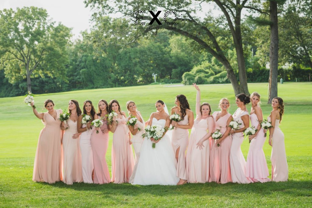bride and bridesmaids outside Muttontown Country Club