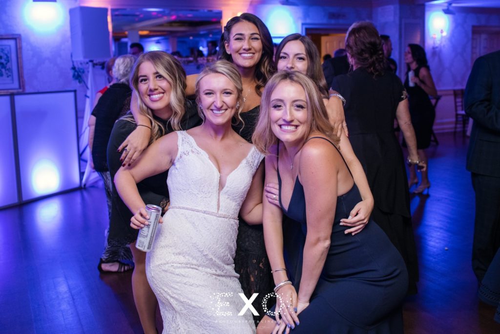 bride and guests having a good time at the reception at Mansion at Timber Point