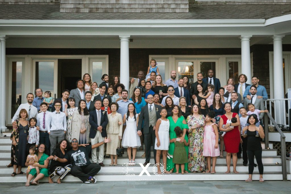 bride and groom with all of their guests at their Sag Harbor Wedding