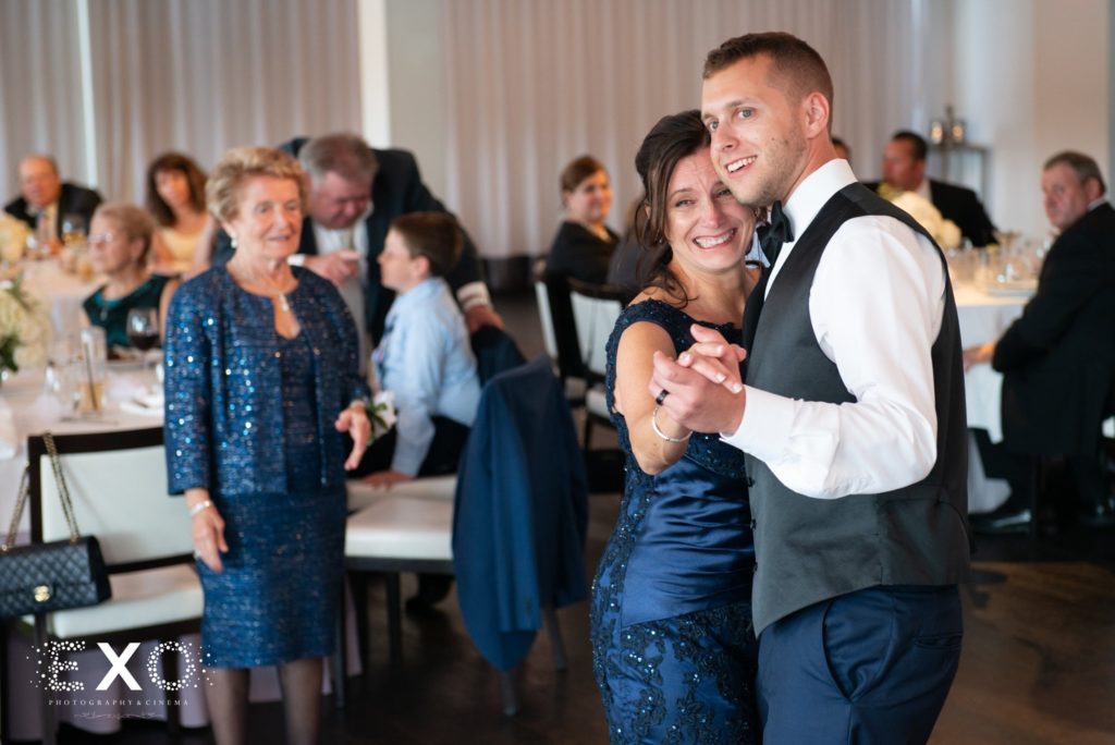 groom and mother dancing at Harbor Club at Prime