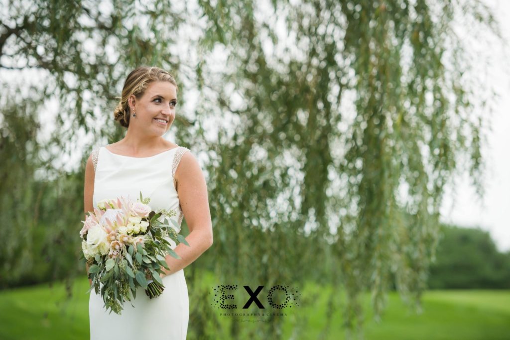 stunning bride outside Willow Creek Golf and Country Club