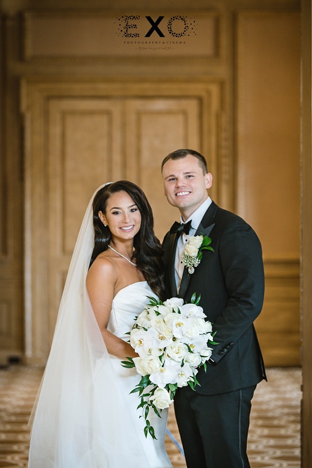 bride and groom inside The Muttontown Country Club