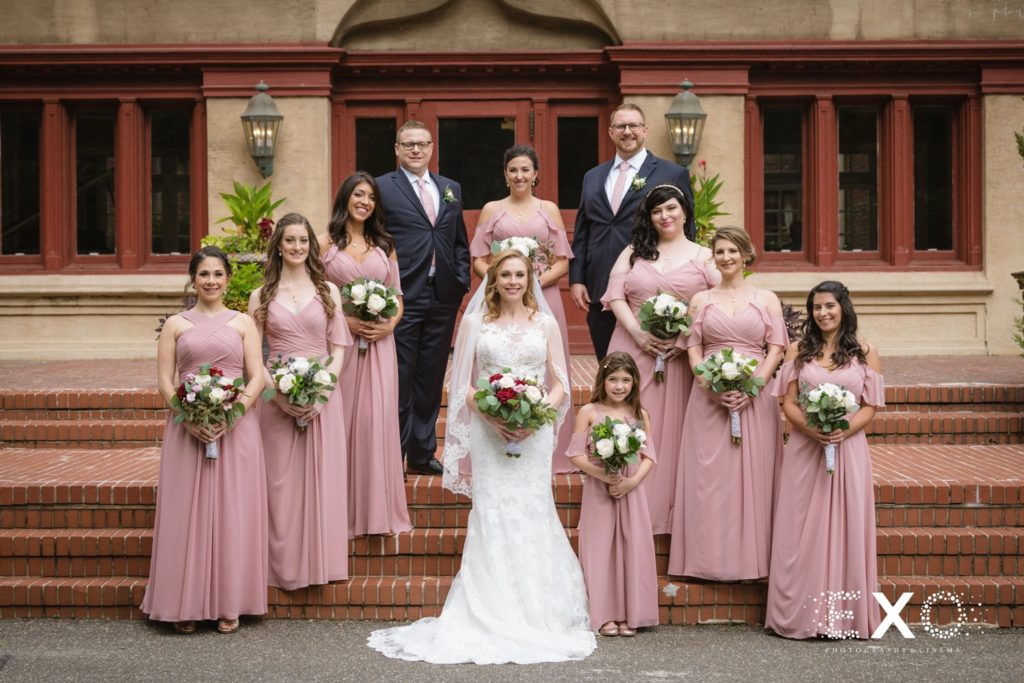 bride and bridesmaids outside Coindre Hall