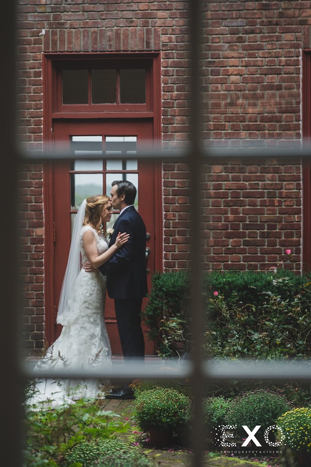 bride and groom alone in the courtyard at Coindre Hall