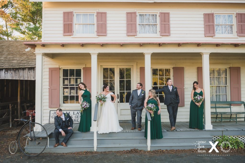 bridal party in the porch at Old Bethpage Village Restoration