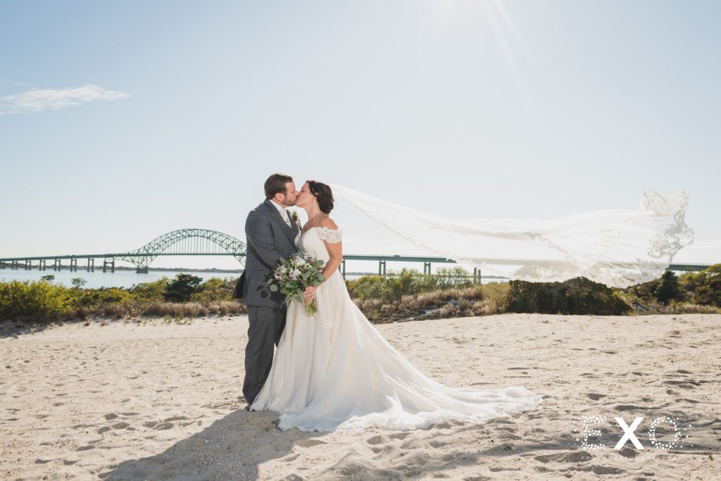 bride and groom on the shore