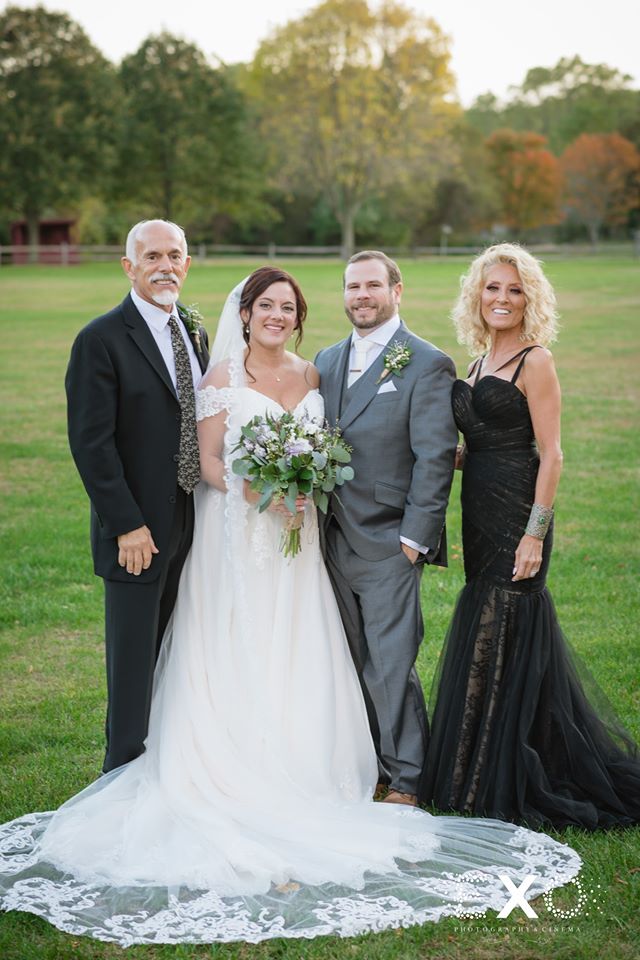 bride and groom with parents at Old Bethpage Village Restoration