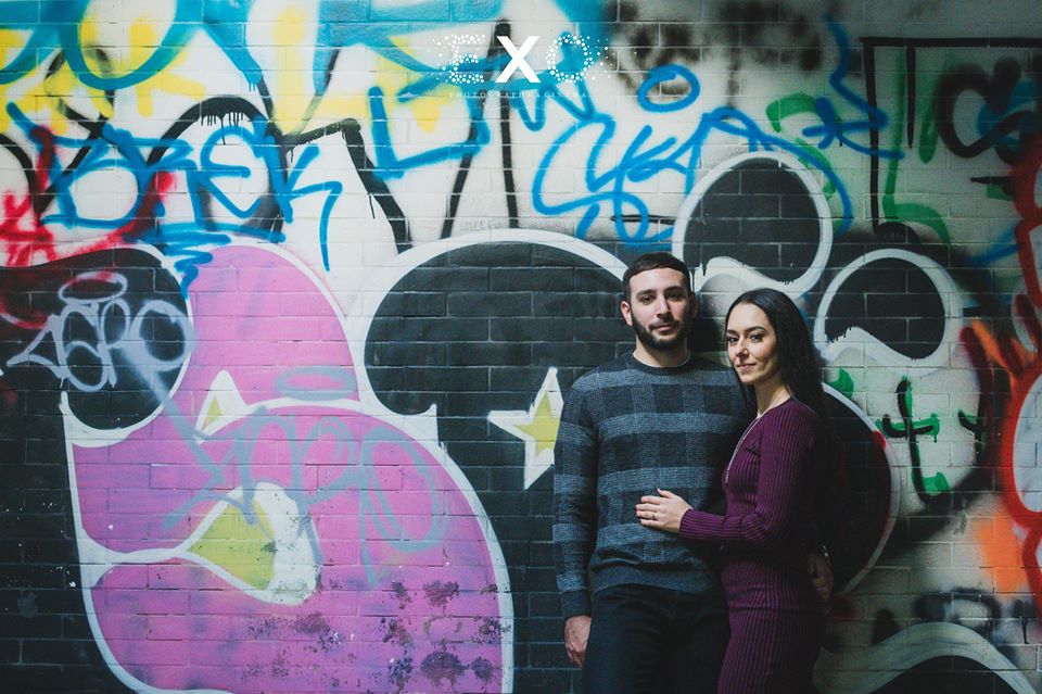 couple by graffiti wall at Welwyn Preserve County Park