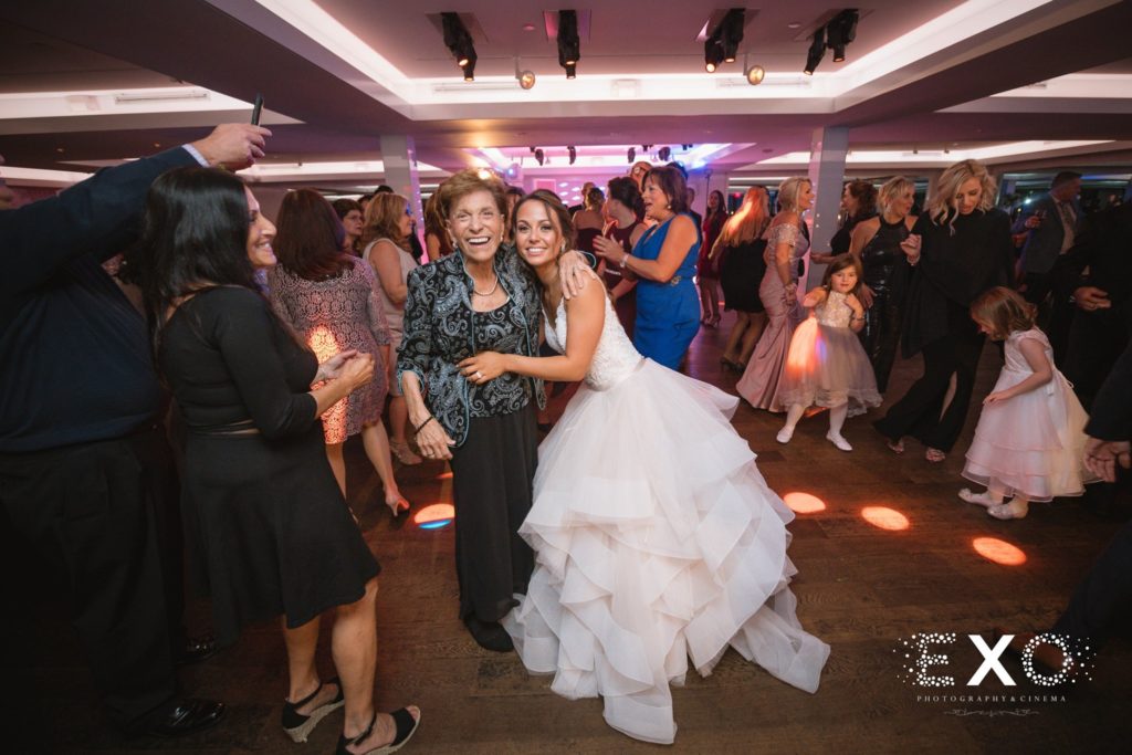 bride and grandmother dancing