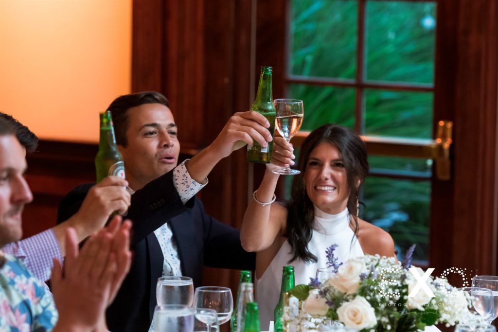 bride and groom giving a toast at the Mansion at Oyster Bay