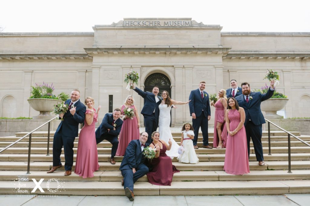 bride and groom with bridal party at heckscher museum