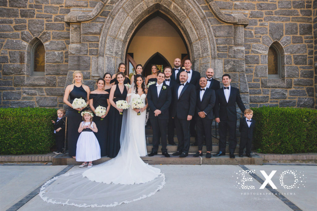 Bridal party at the steps of the church