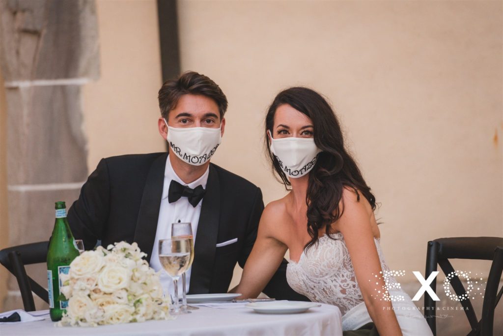 bride and groom in mask