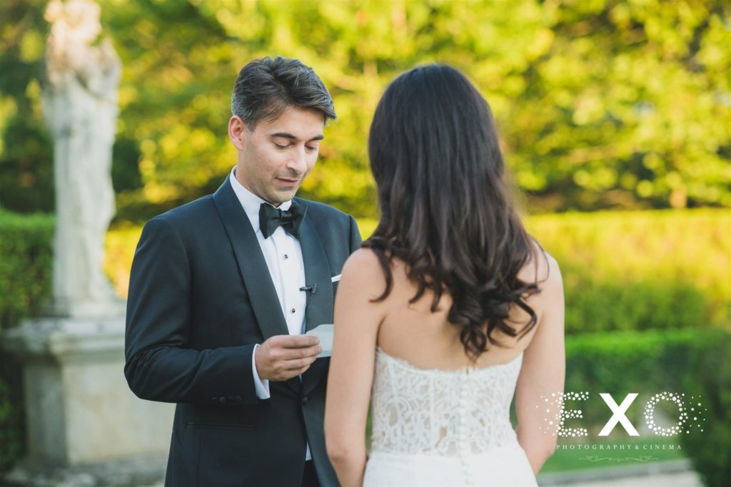 groom reading vows to bride