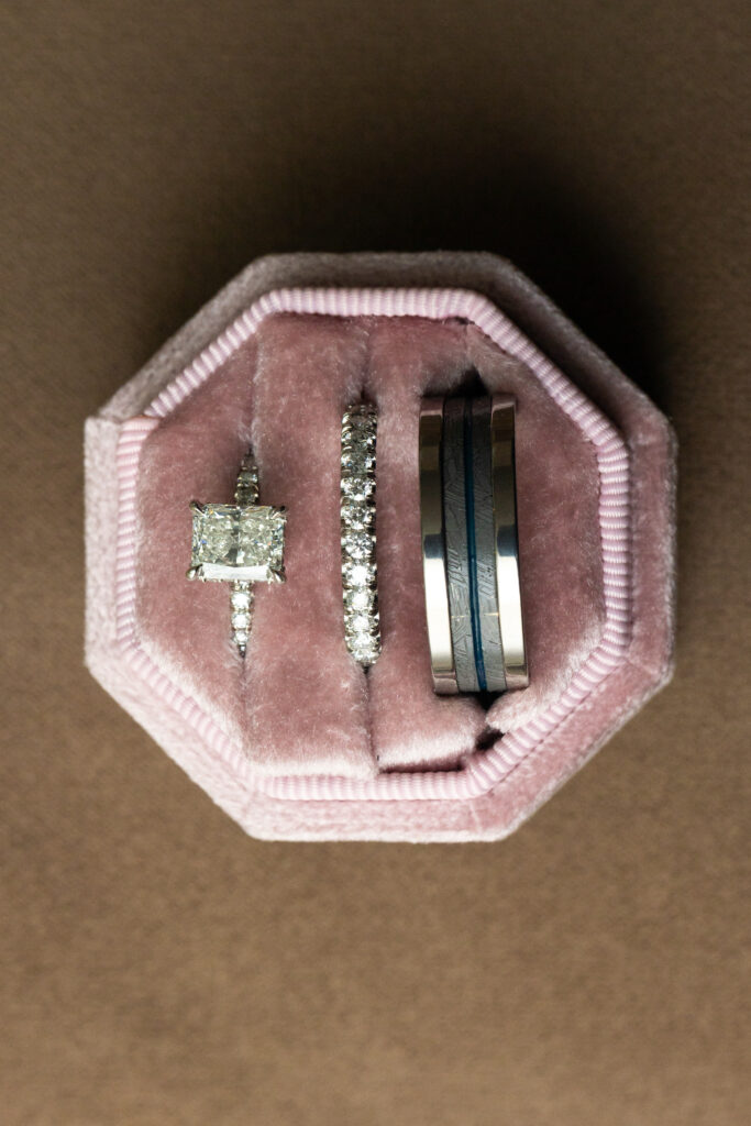 Pink ring box with wedding rings