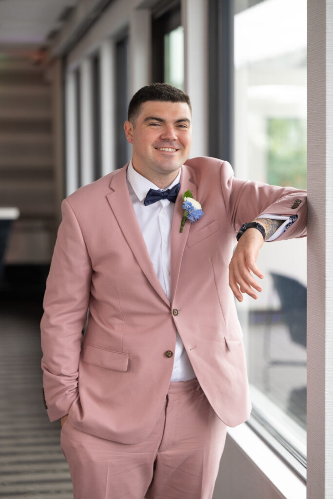 Groom in a pink suit