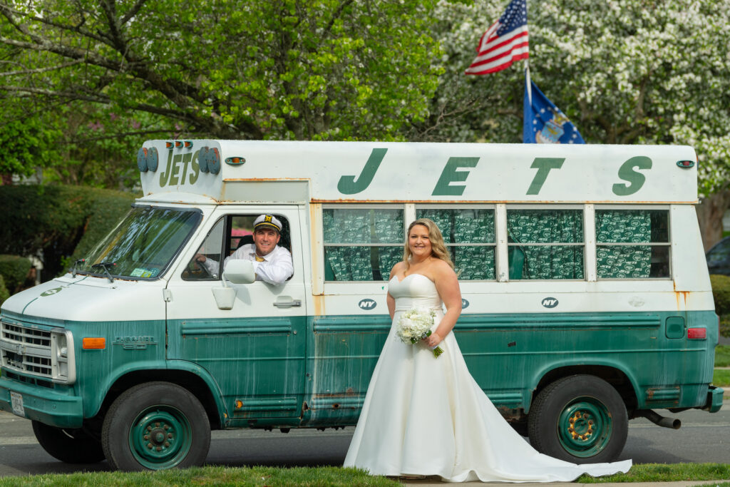 Bride in front of a Jets van