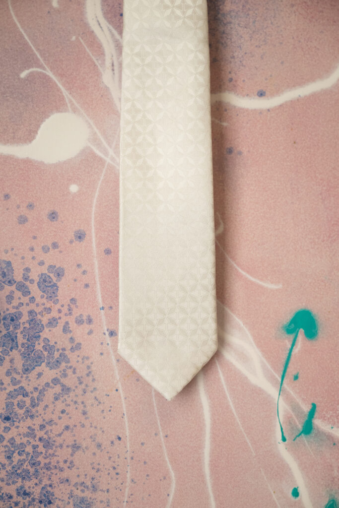 White groom's tie
