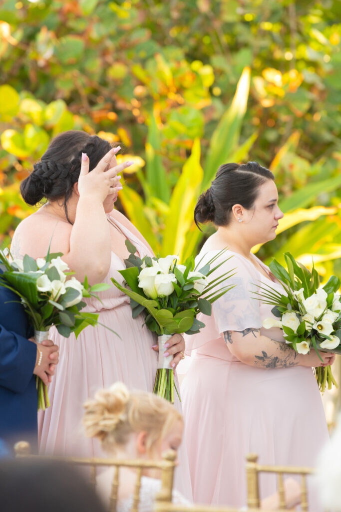 Crying bridesmaid during a wedding ceremony Tideline ocean resort and spa