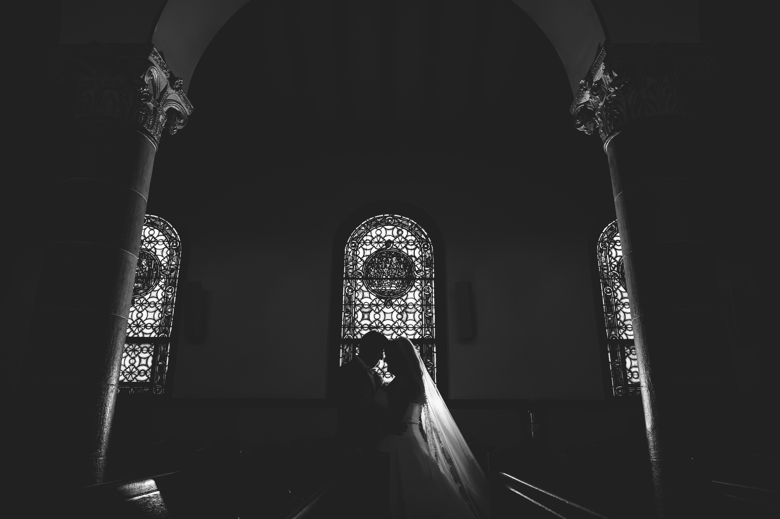 Bride and groom sillouhete at church