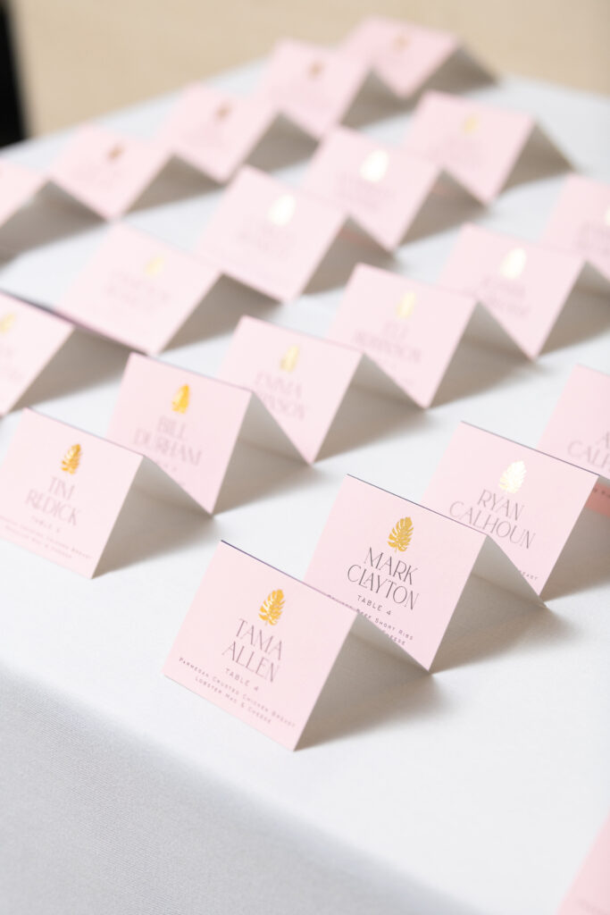 Wedding place cards in pink and gold