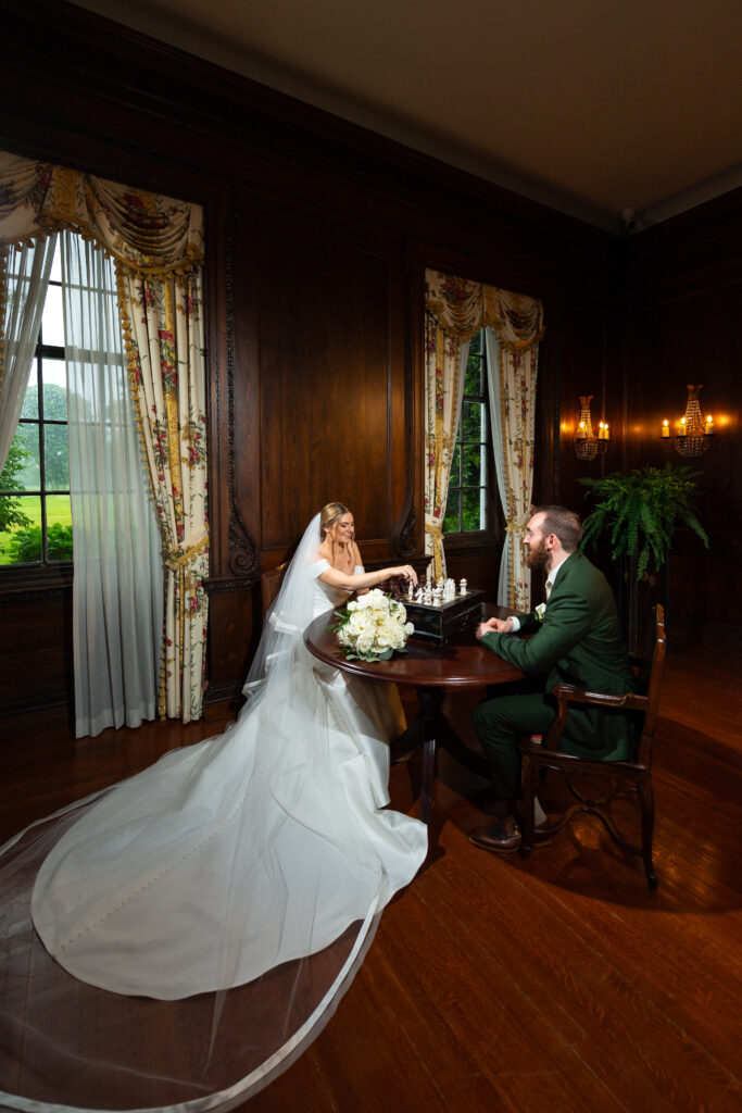 The Woodside Club bride and groom playing chess