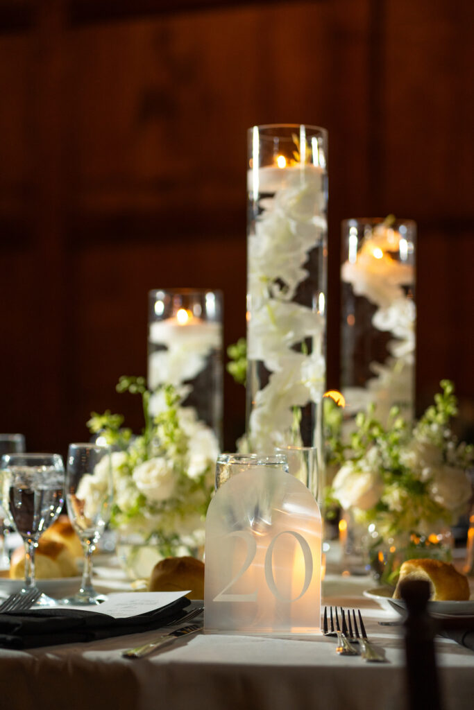 The Barn at Old Bethpage wedding centerpieces from Spitz and Peck