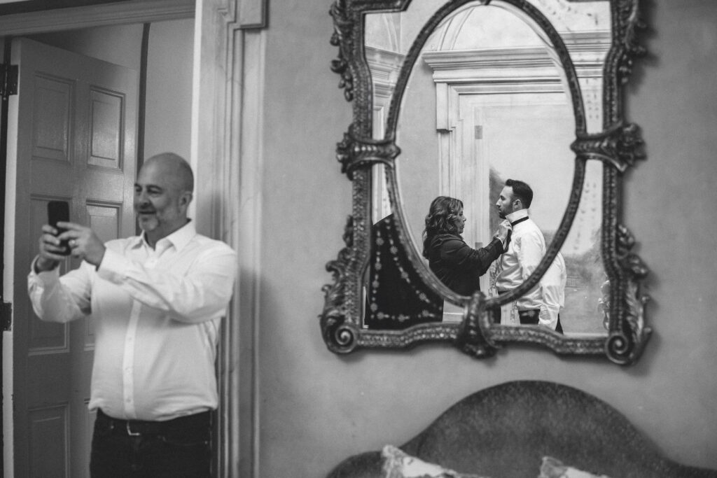 Groom prep creative photo at The Mansion at Oyster Bay