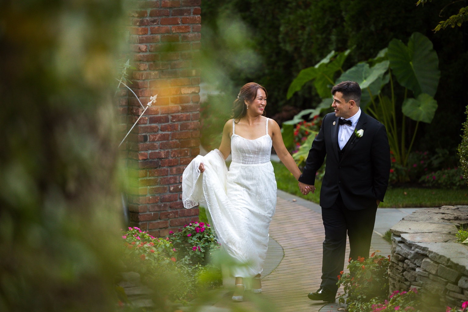 Fox Hollow couple walking garden path