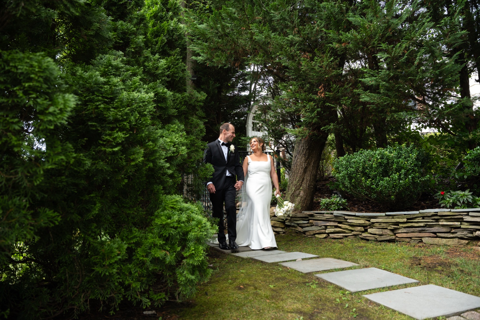 Fox Hollow couple on garden walkway